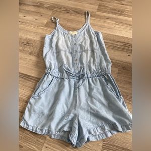 Cloth and Stone Romper. Anthropologie. Chambray light blue straps pockets button